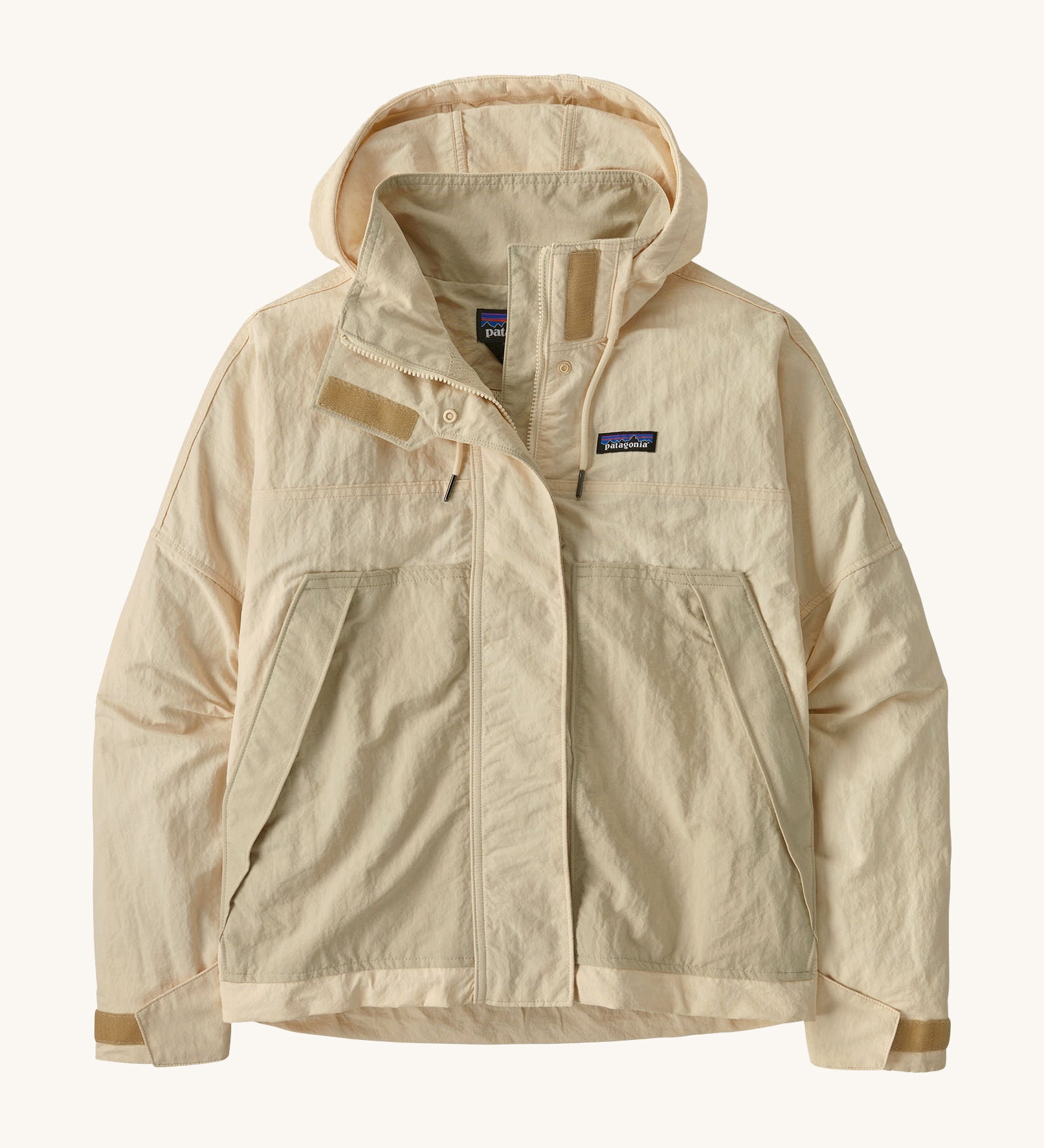 Patagonia women's skysail jacket in a natural colour on a cream background