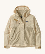 Patagonia women's skysail jacket in a natural colour on a cream background