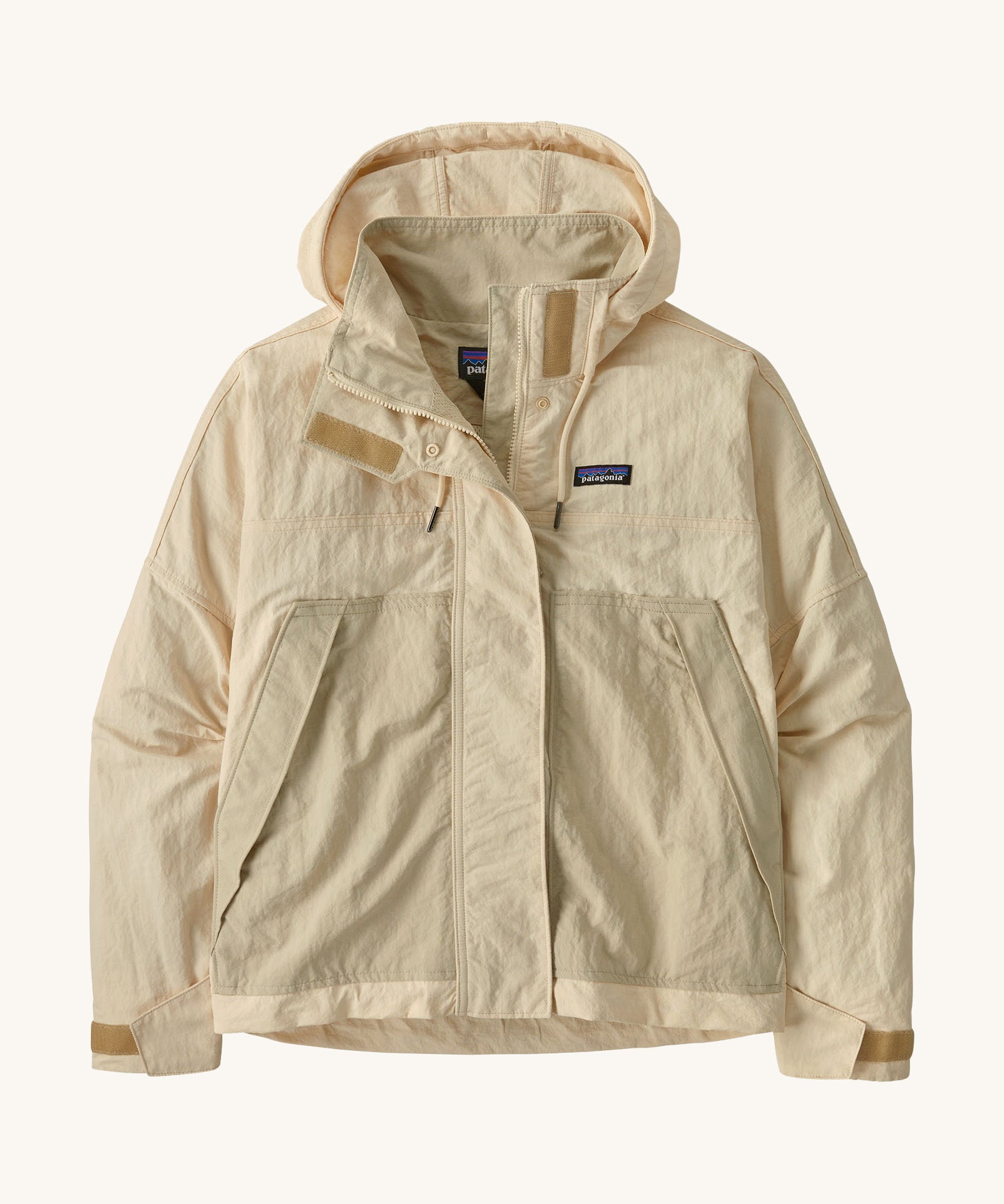 Patagonia women's skysail jacket in a natural colour on a cream background