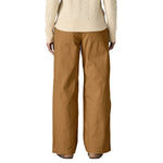 Rear view of the Patagonia women's nest brown canvas trousers. Showing the wide leg fit and 2 back pockets