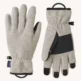 Patagonia adult synchilla gloves in oatmeal heather. Features a grip on the palms and fingertips. Logo label is stitched on the side . 