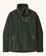Patagonia men's retro pile fleece jacket in old growth green colour. A thick green fleece with a full length zip and turn up collar, 2 side pockets and a chest pocket with the brand patch stitched on the chest.