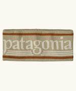 Patagonia powder town fleece lined headband with a hut tripper logo design in weathered stone.