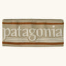 Patagonia powder town fleece lined headband with a hut tripper logo design in weathered stone.