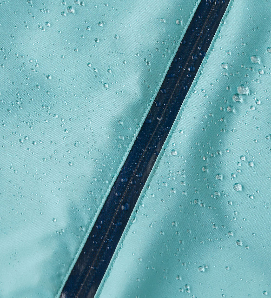  in a solid blue colour with reflective strips on the arms and stirrup straps on the feet. One-Piece is