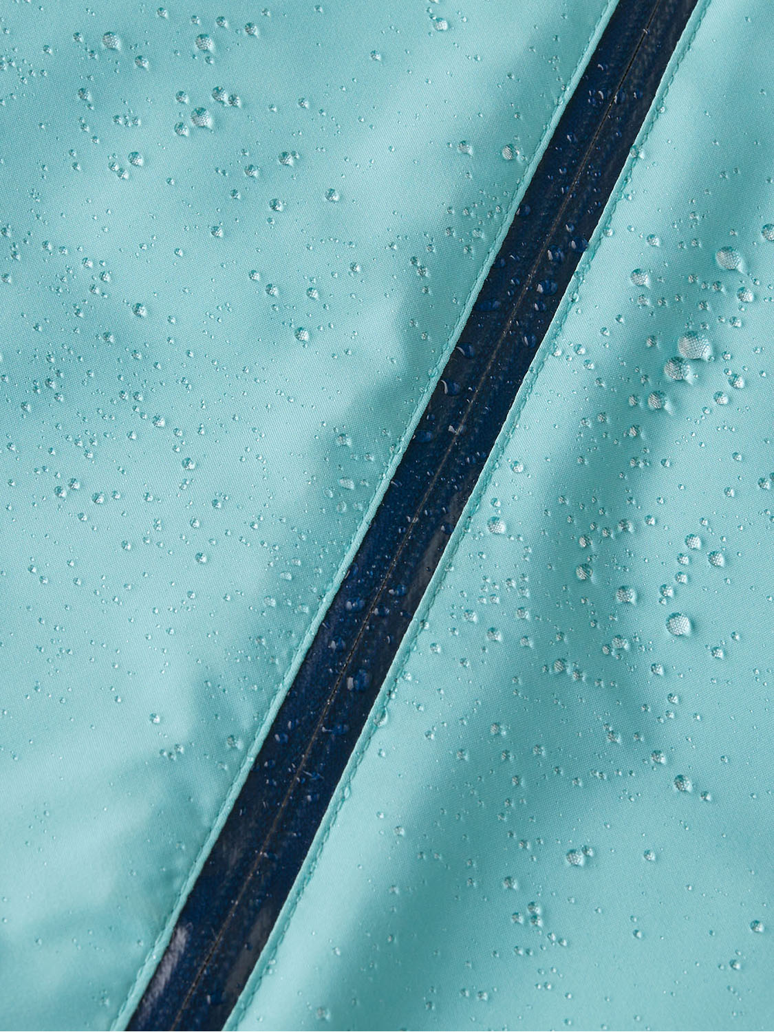  in a solid blue colour with reflective strips on the arms and stirrup straps on the feet. One-Piece is