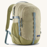 Patagonia refugio 26L back pack in weathered stone with grey straps and buckles. 