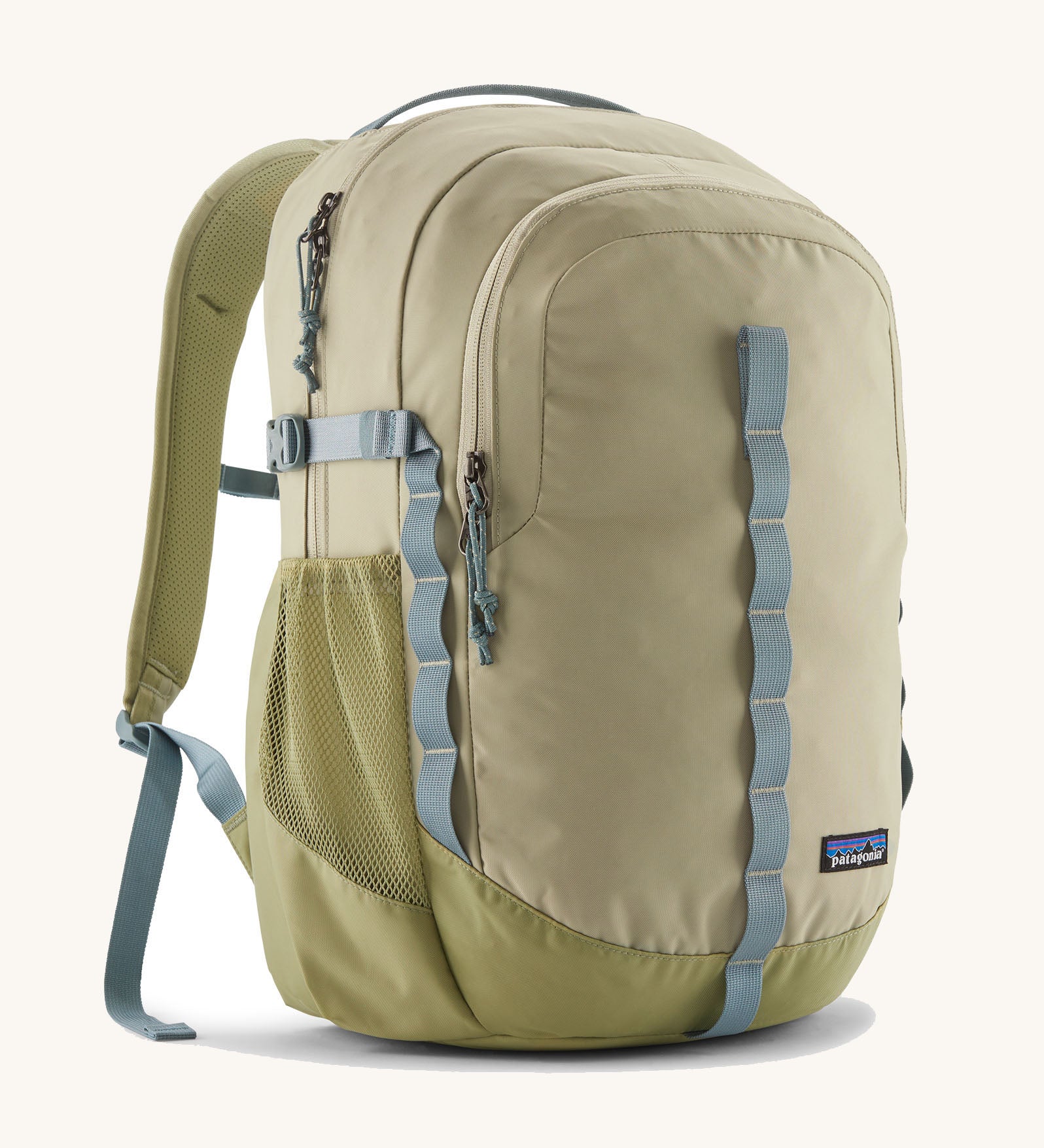 Patagonia refugio 26L back pack in weathered stone with grey straps and buckles. 