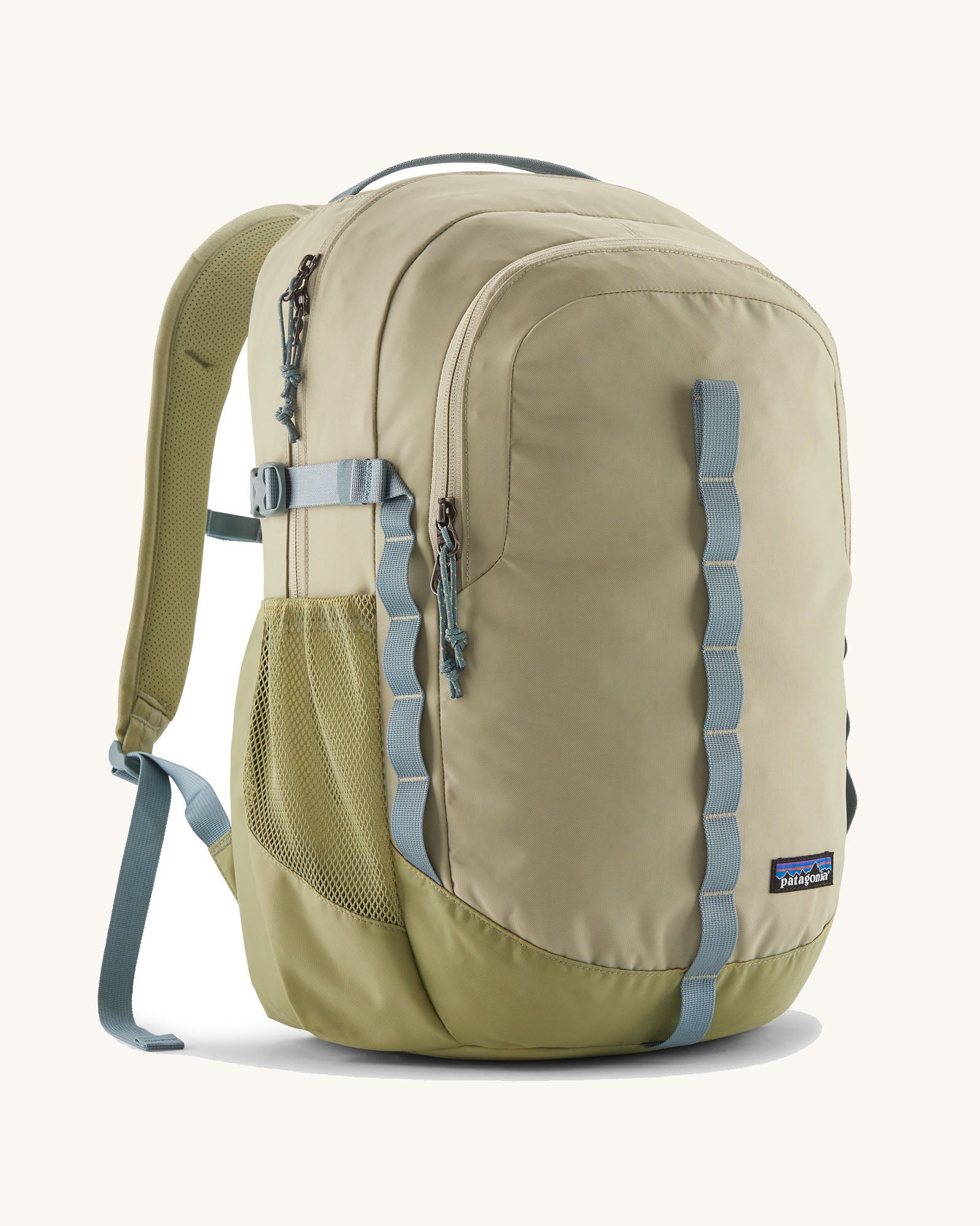 Patagonia refugio 26L back pack in weathered stone with grey straps and buckles. 