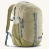 Patagonia refugio 26L back pack in weathered stone with grey straps and buckles. 