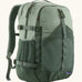 Patagonia refugio day pack 30L backpack in a two tone cover green. Large zipped compartments, side bottle holders and equipment straps.