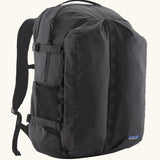 Patagonia refugio day pack 32 litre backpack in black. One large main zipped compartment with two pockets and bottle holders on the side. 