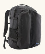 Patagonia refugio day pack 32 litre backpack in black. One large main zipped compartment with two pockets and bottle holders on the side. 