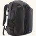 Patagonia refugio day pack 32 litre backpack in black. One large main zipped compartment with two pockets and bottle holders on the side. 