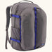 Patagonia refugio day pack 32 litre backpack in may grey with contrasting blue equipment straps.
