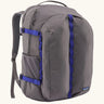 Patagonia refugio day pack 32 litre backpack in may grey with contrasting blue equipment straps.