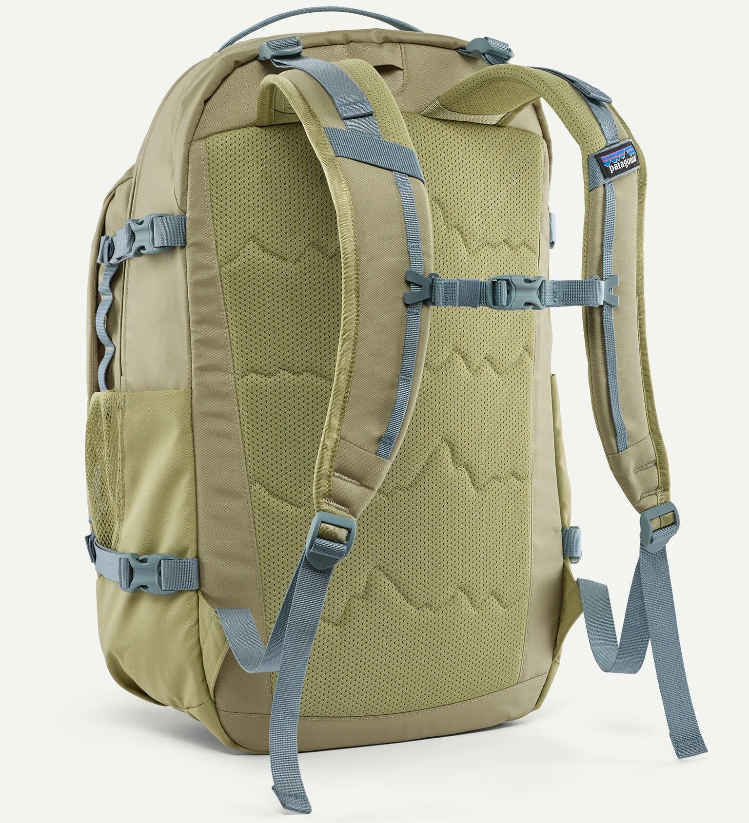Back of the Patagonia refugio 32L daypack in weathered stone light green and blue trim. Padded straps and quick release buckle chest strap.