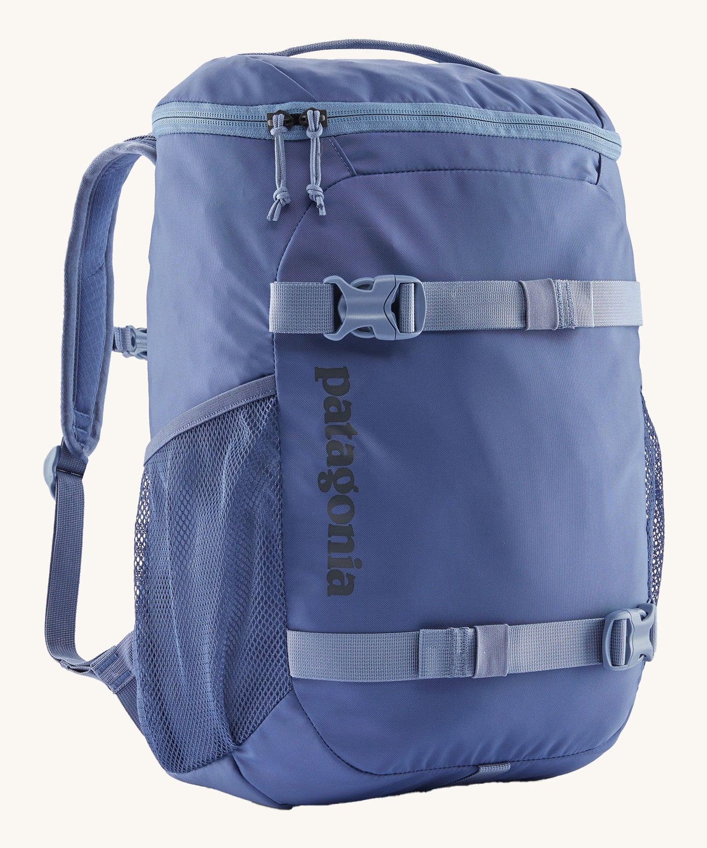 Patagonia refugito 18 litres daypack in sunken blue. A dark blue backpack and features 2 side mesh pockets, buckle fasteners on the front to keep it secure and a zip on the top for easy access.
