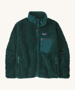 Patagonia womens retro-x jacket. A thick dark green fleece. Features a full length zip, chest and side pockets and a logo patch stitched on the left chest.