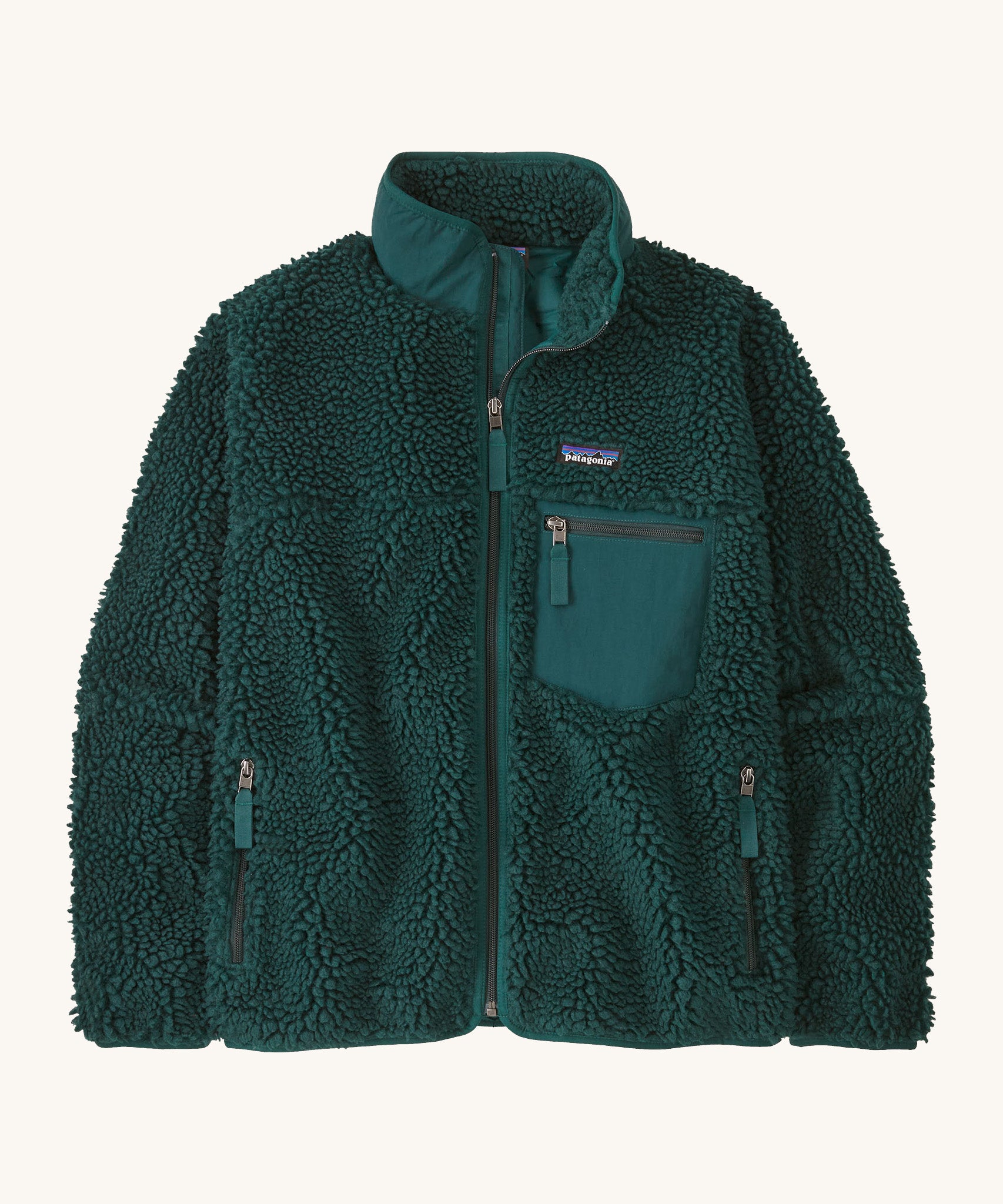 Patagonia womens retro-x jacket. A thick dark green fleece. Features a full length zip, chest and side pockets and a logo patch stitched on the left chest.