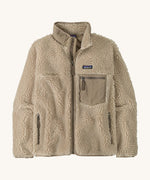 Patagonia womens retro-x jacket. A thick natural colour fleece. Features a full length zip, chest and side pockets and a logo patch stitched on the left chest.