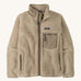 Patagonia womens retro-x jacket. A thick natural colour fleece. Features a full length zip, chest and side pockets and a logo patch stitched on the left chest.