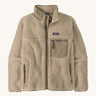 Patagonia womens retro-x jacket. A thick natural colour fleece. Features a full length zip, chest and side pockets and a logo patch stitched on the left chest.