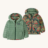 Patagonia Kids Reversible Down Hoody in see saw owl/cascade green design side by side showing the different colour and print detail.