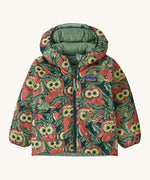 Patagonia little kids down hooded jacket in cascade green/see saw owl. A light warm reversible jacket with a bold funky owl design and  light green on the reversible side. Features a a full length zip and 2 side  pouch pockets