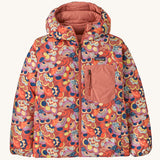 Patagonia Kids Reversible Down Hoody in river river and potters red design. A long sleeve jacket in a colourful paisley design featuring a full length zip and pale pink chest pocket. 