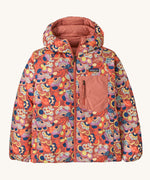 Patagonia Kids Reversible Down Hoody in river river and potters red design. A long sleeve jacket in a colourful paisley design featuring a full length zip and pale pink chest pocket. 