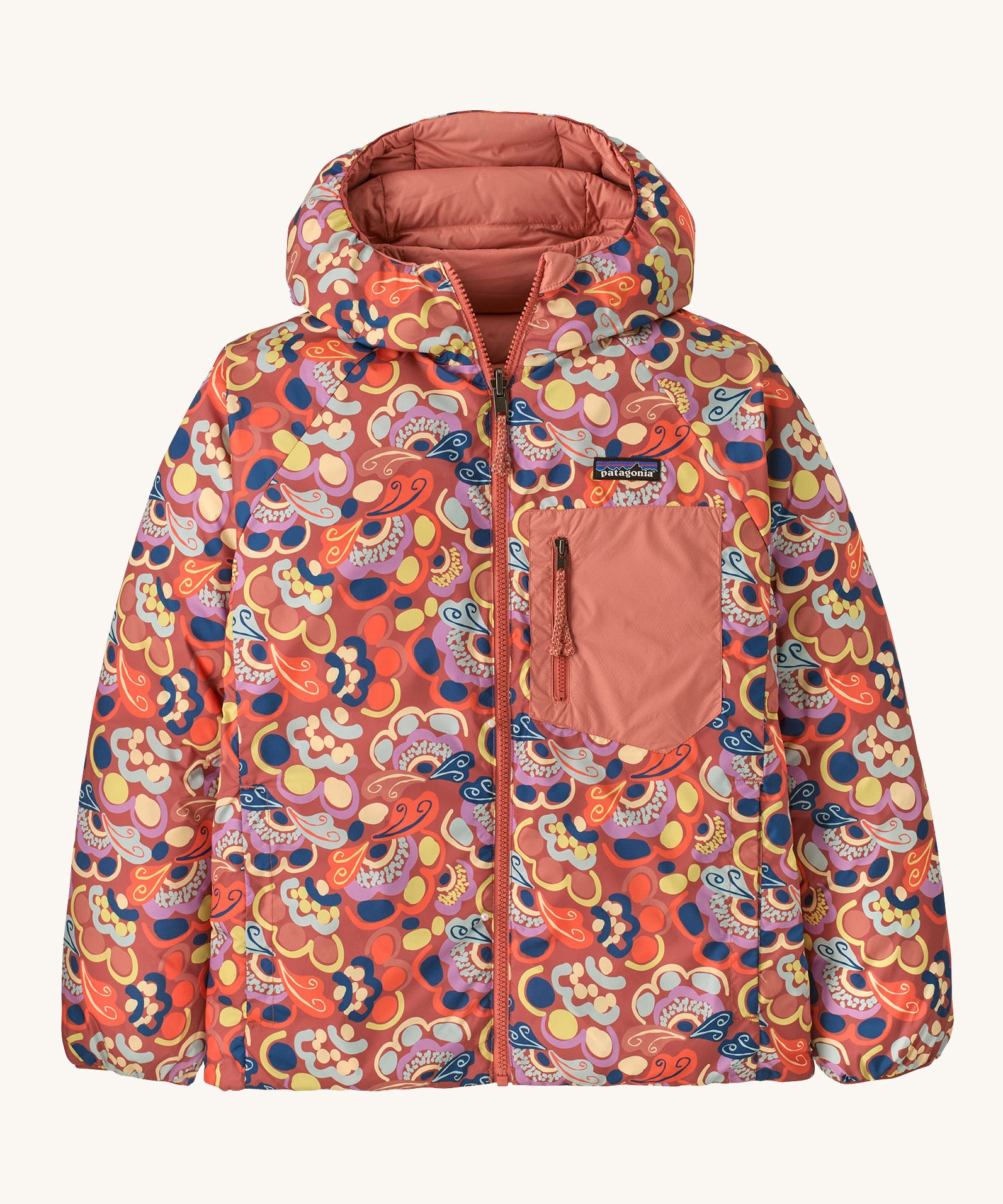 Patagonia Kids Reversible Down Hoody in river river and potters red design. A long sleeve jacket in a colourful paisley design featuring a full length zip and pale pink chest pocket. 