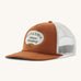 Patagonia broadcaster cap in brown colour on a cream background.