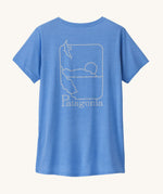 Patagonia women's short sleeve top in light blue beach outline and logo design on a cream background.