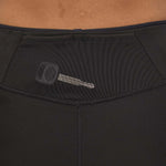 Close up of a car key in the back pocket of the Patagonia eco-friendly endless run tights 