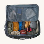 Patagonia 100 litres duffel bag in a navy blue colour fully packed and inside detail