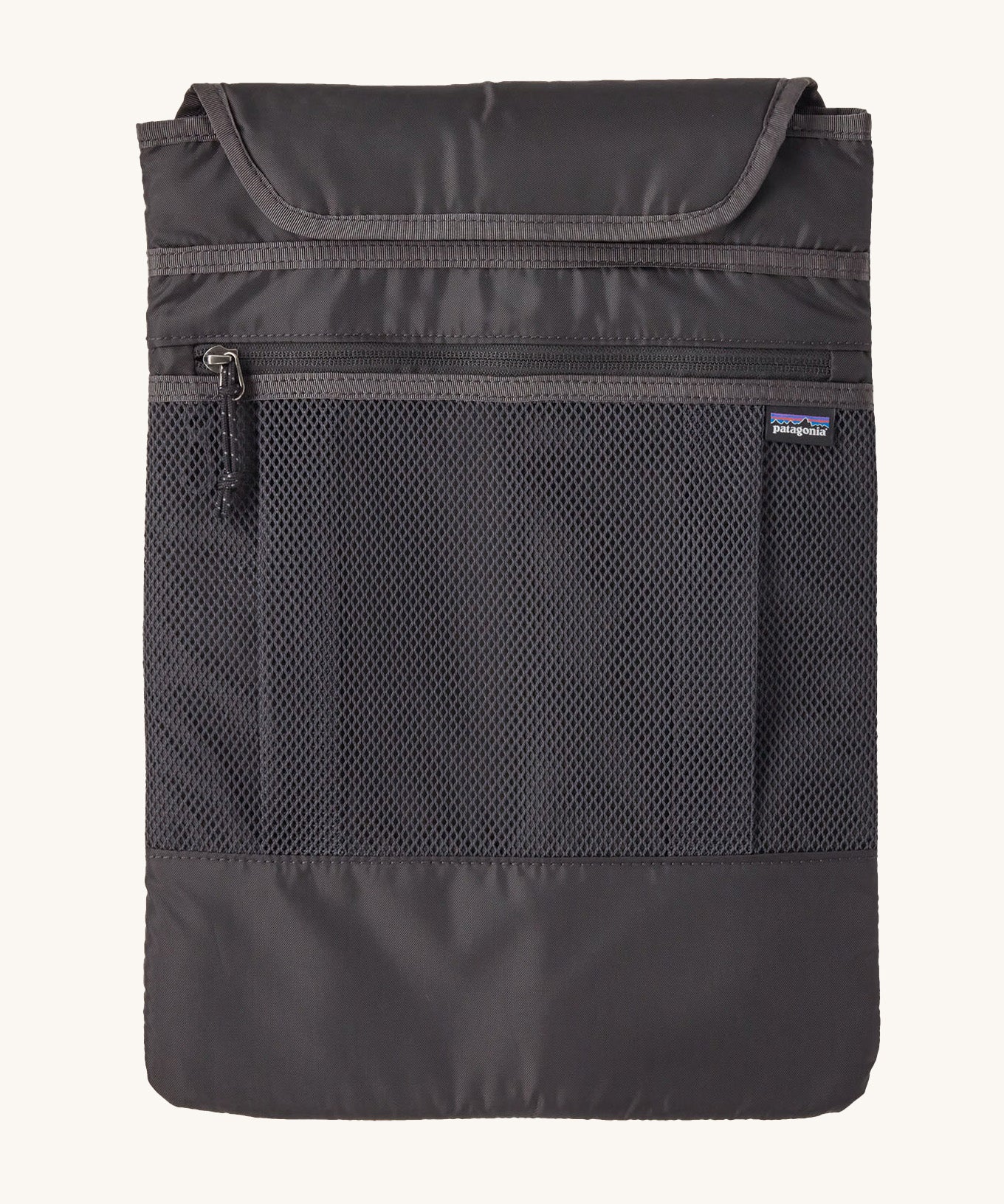 The laptop sleeve of the smolder blue Patagonia Refugio Day Pack 26L