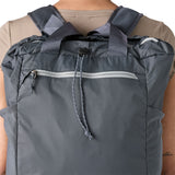 A close up view of the zip and toggle detail on the smolder blue tote bag