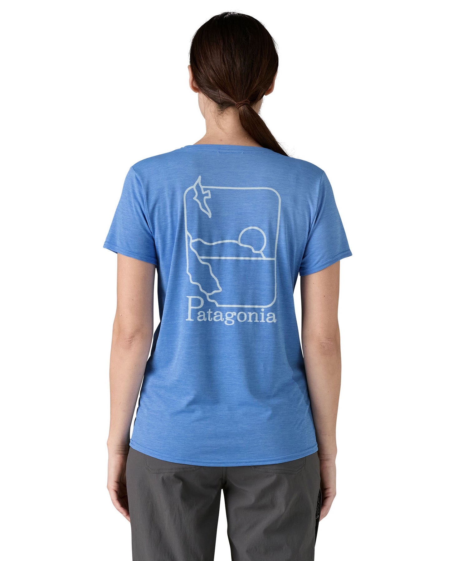 Patagonia women's short sleeve top in light blue beach outline and logo design back detail