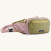 Patagonia terravia hip pack in quiet violet with a green front panel and a small black logo tag on the front. 