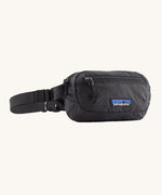 The Patagonia terravia mini bum bag hip pack in black.