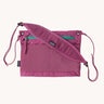 Patagonia terravia sacoche cross body bag in faded magenta with padded shoulder pad. 