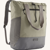 Patagonia Terravia tote bag in river rock green colour showing the front zip and strap details with the brand log on the bottom grey panel. Features shoulder straps for easy carrying 