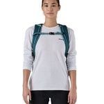 Patagonia 25L black hole backpack in a tidal teal colour shoulder strap and clip detail