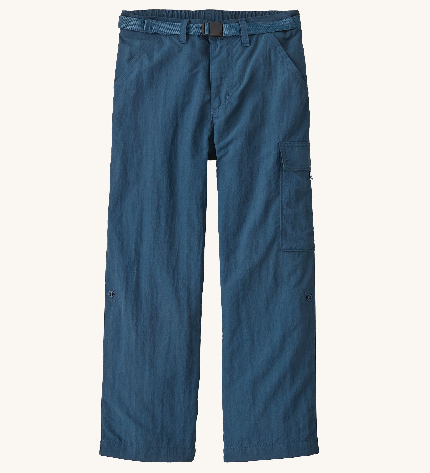 Patagonia kids everyday outdoor pants in a navy colour on a cream background.