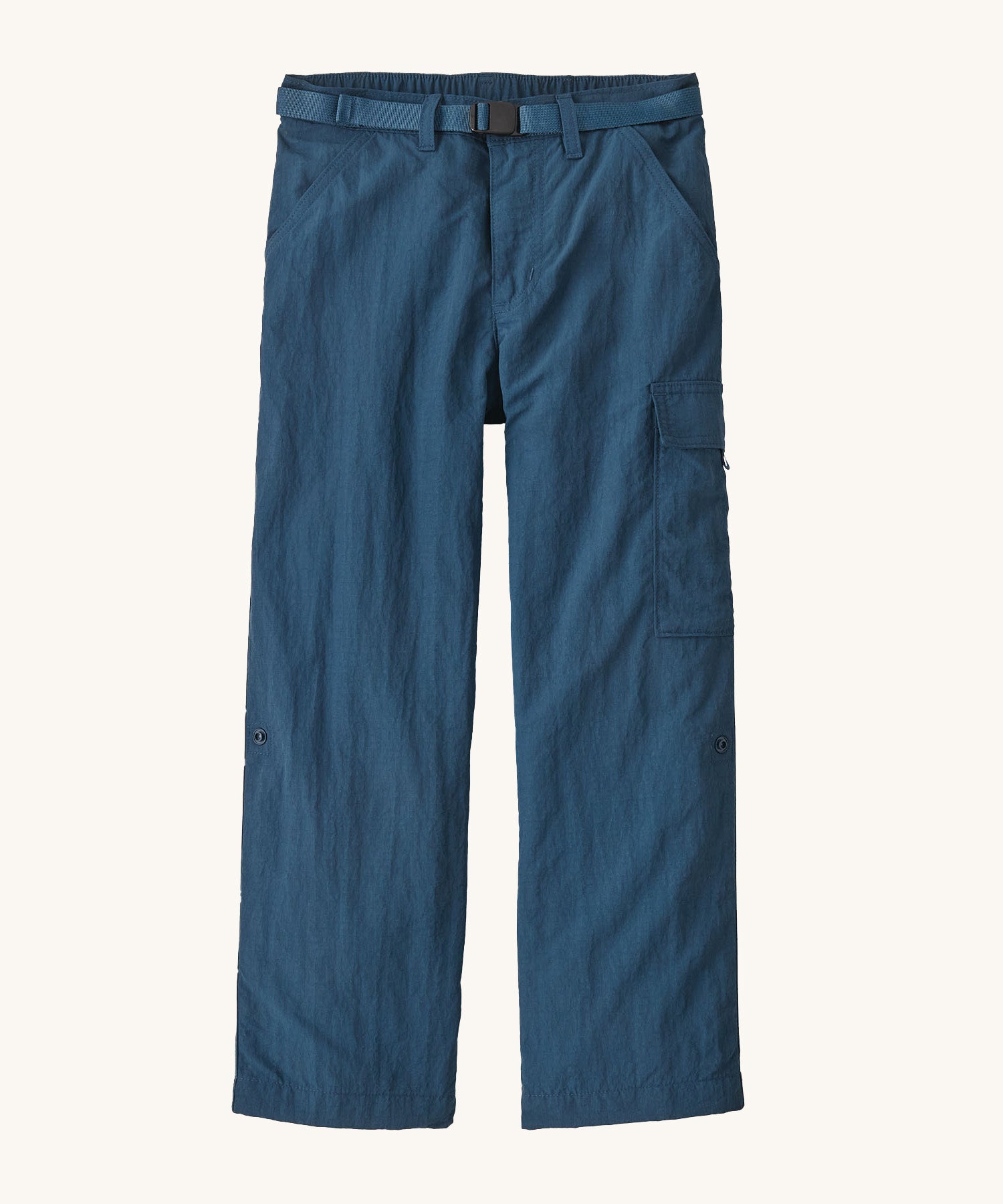 Patagonia kids everyday outdoor pants in a navy colour on a cream background.