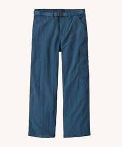 Patagonia kids everyday outdoor pants in a navy colour on a cream background.