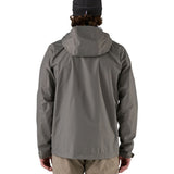 Patagonia men's 3 layer torrentshell rain jacket worn by a man back detail