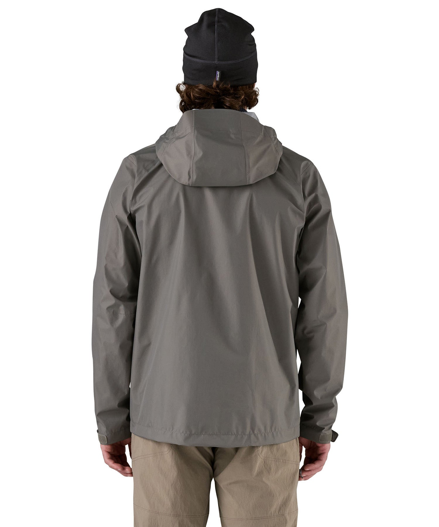 Patagonia men's 3 layer torrentshell rain jacket worn by a man back detail