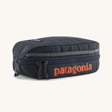 Patagonia Black Hole Small 3L Travel Cube Wash Bag - Smolder Blue on a cream background